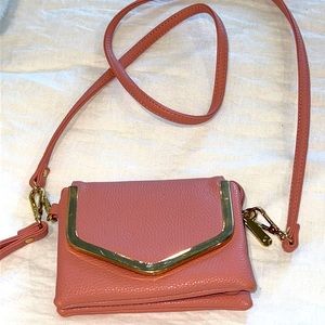 Small pink cross body or wristlet purse
